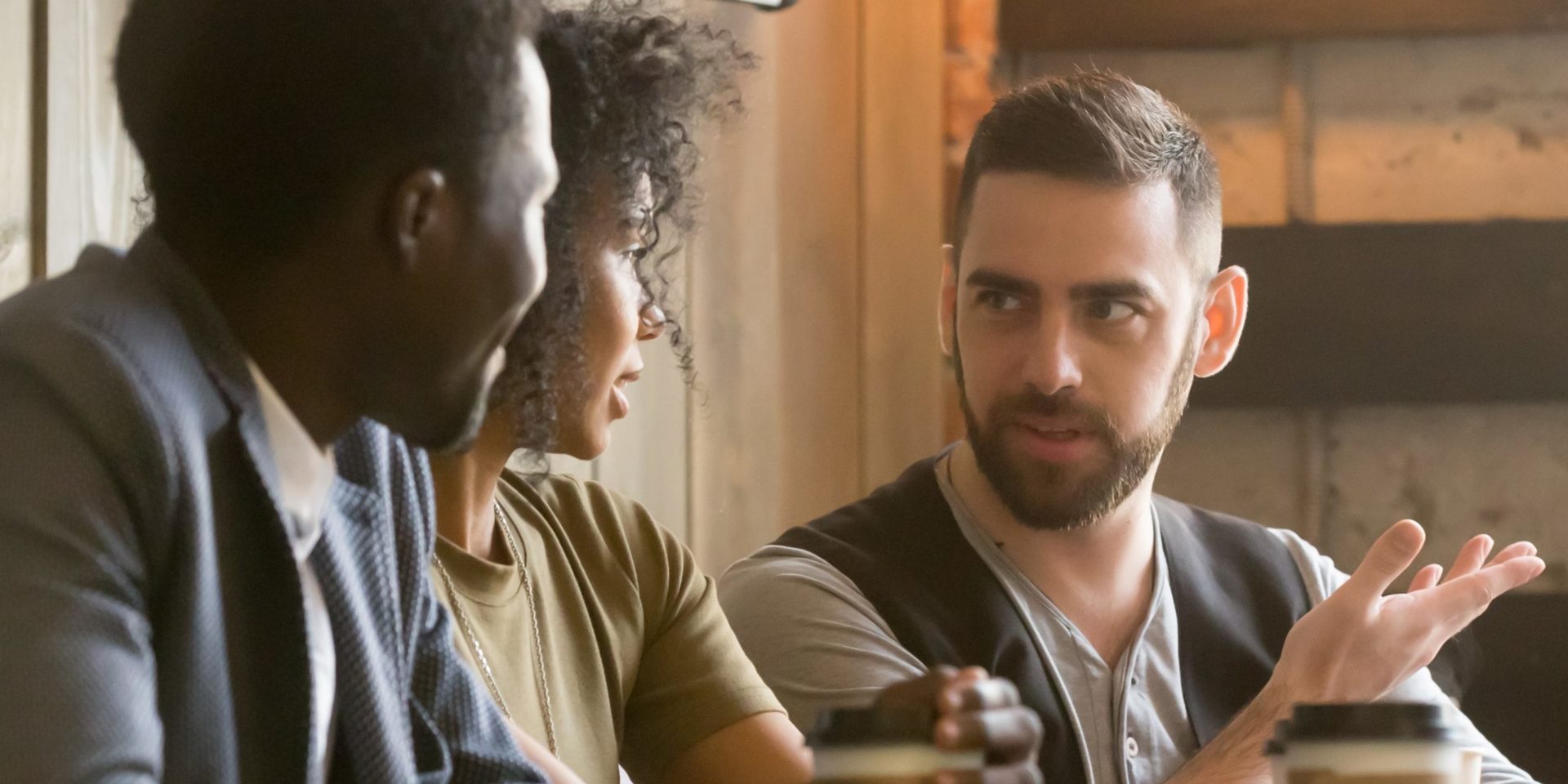 Friends socializing over coffee